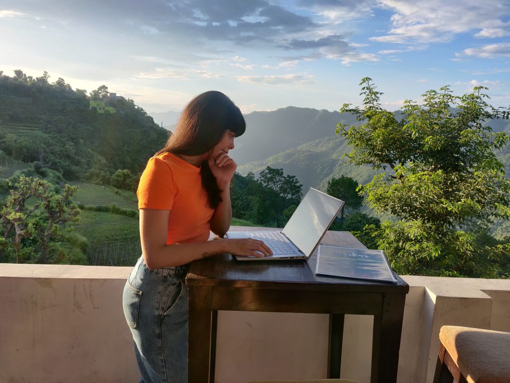 woman working in the mountains remote work